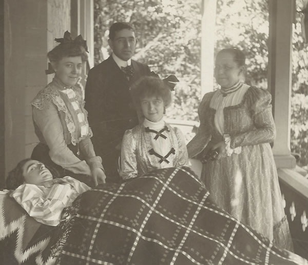 Will Adams with unidentified friends on the Adams family’s back porch